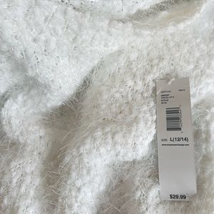 Fuzzy, soft and knit sweater